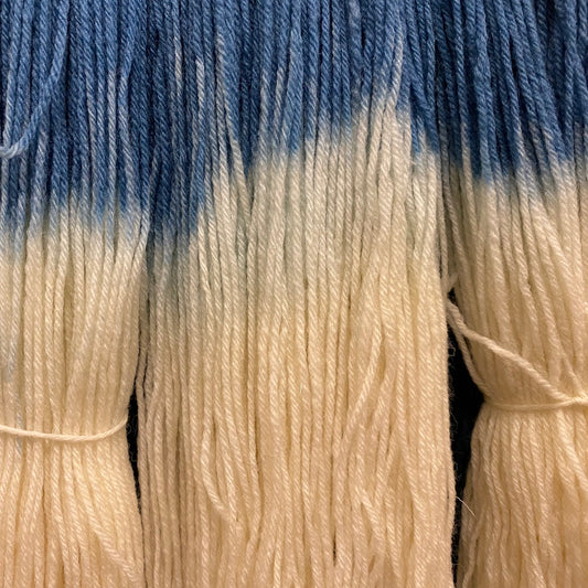 A close up of Assigned Pooling Yarn Indigo and Natural